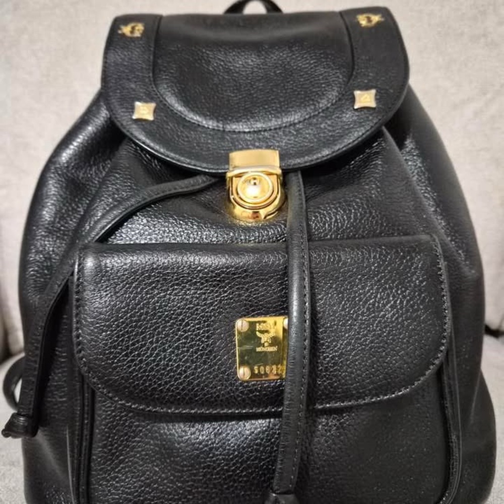 MCM Black Leather Backpack with Gold Accents